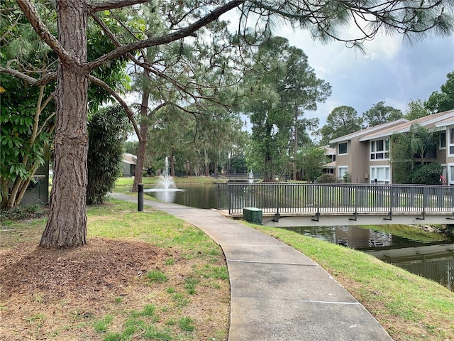 view of home's community featuring a water view