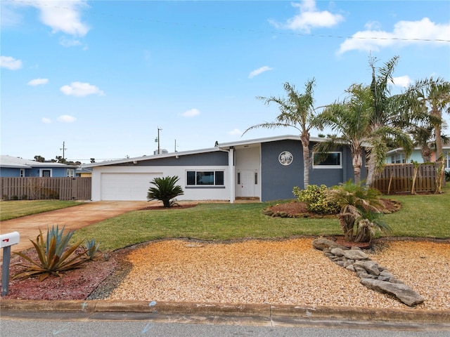 ranch-style house with a garage and a front yard