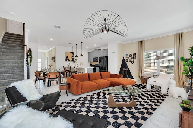 living room featuring ornamental molding