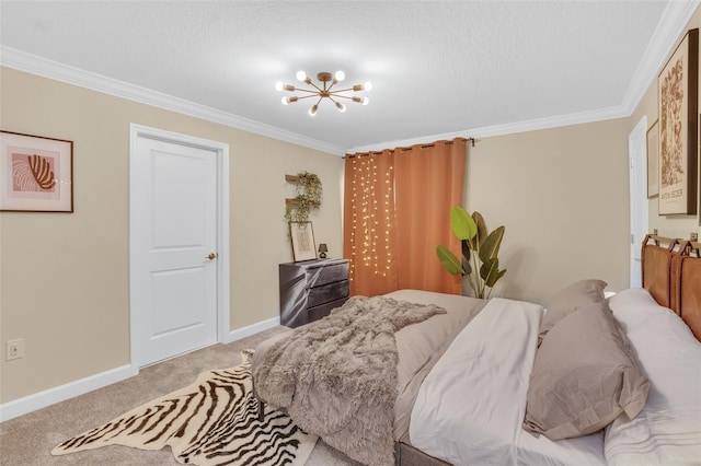 bedroom featuring a notable chandelier, ornamental molding, a textured ceiling, and carpet flooring