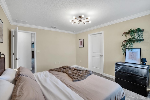 carpeted bedroom featuring crown molding, a chandelier, and a textured ceiling