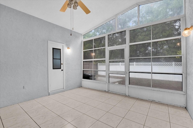 unfurnished sunroom featuring lofted ceiling and ceiling fan