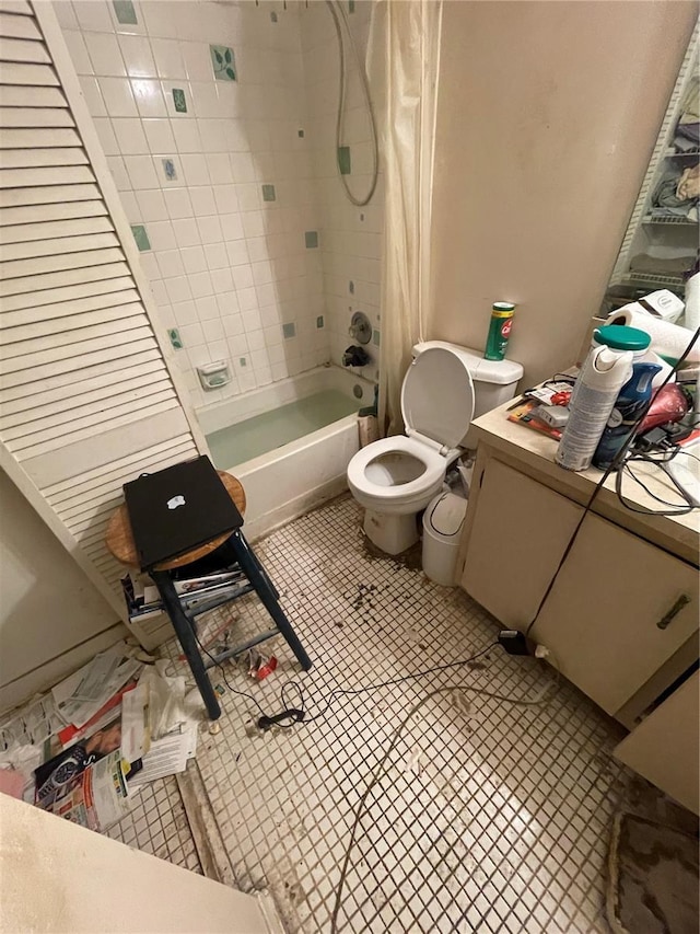 bathroom with tile patterned floors, toilet, and shower / bath combo