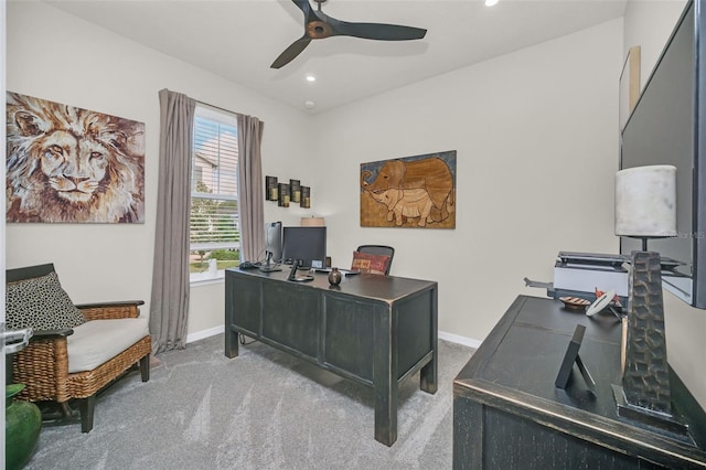 carpeted office with ceiling fan