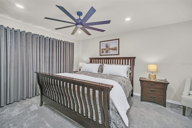 carpeted bedroom with ceiling fan