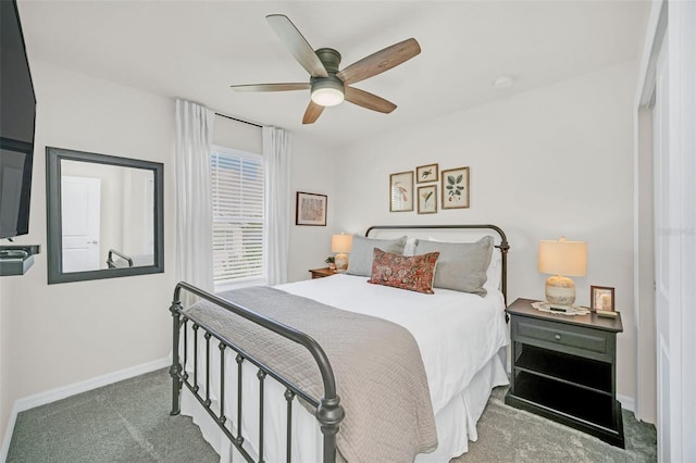 bedroom with ceiling fan and carpet