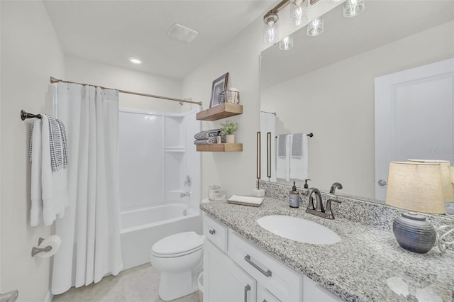 full bathroom with vanity, tile patterned flooring, toilet, and shower / bath combo with shower curtain