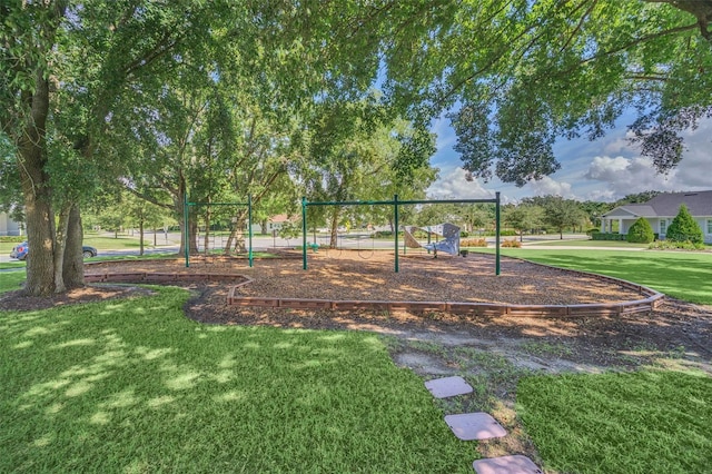 view of play area featuring a lawn