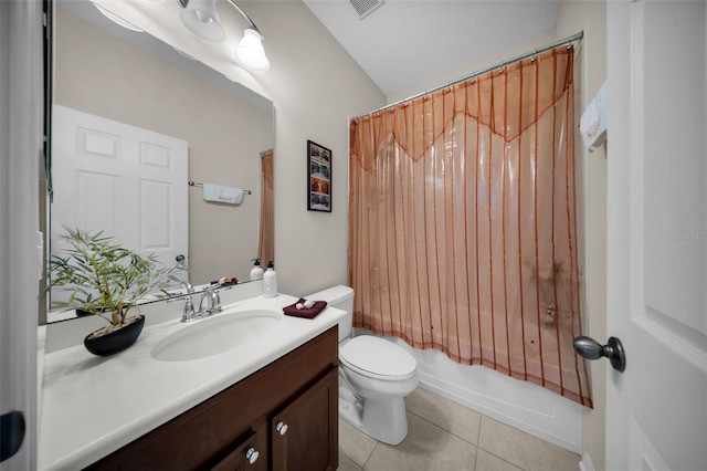 full bathroom with shower / tub combo with curtain, vanity, tile patterned floors, and toilet