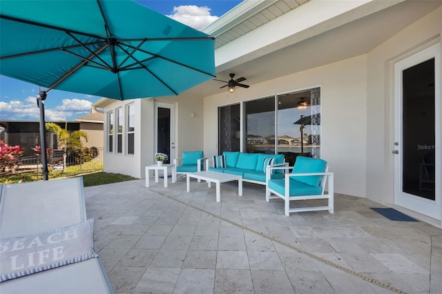 view of patio / terrace with an outdoor hangout area and ceiling fan