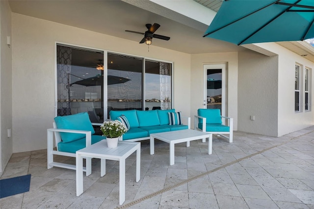 view of patio / terrace with ceiling fan and an outdoor hangout area