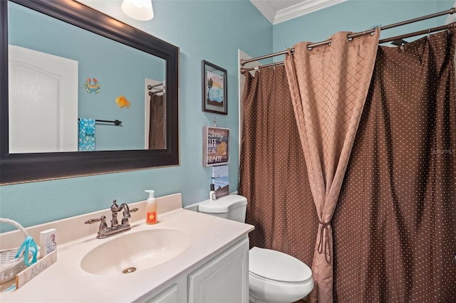 bathroom with ornamental molding, vanity, toilet, and curtained shower