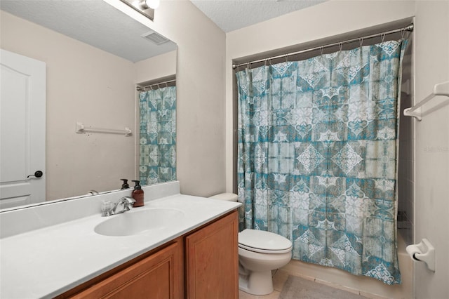 bathroom featuring a textured ceiling, toilet, visible vents, vanity, and shower / tub combo with curtain