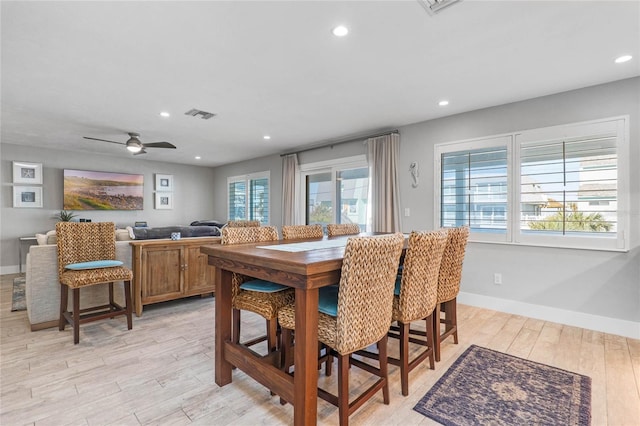dining room with ceiling fan, light wood-style floors, recessed lighting, baseboards, and visible vents