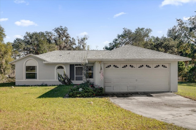 ranch-style home with a garage and a front yard