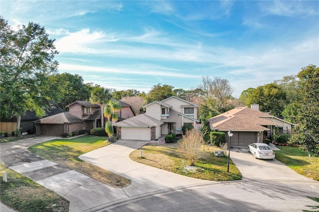 view of front of home with a garage and a front lawn