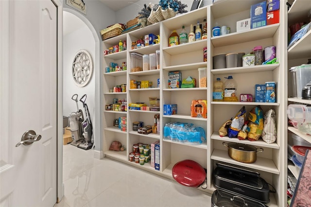 rec room with light tile patterned flooring