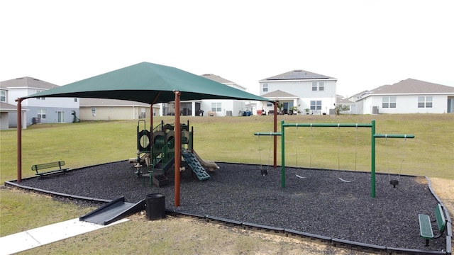 view of playground featuring a lawn