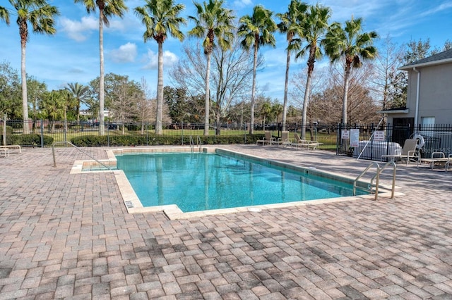 view of swimming pool featuring a patio