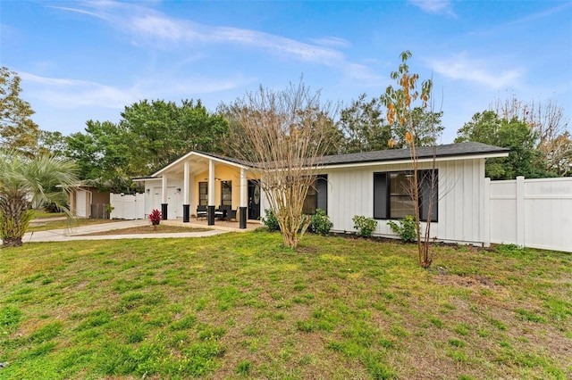 view of front of property with a front lawn