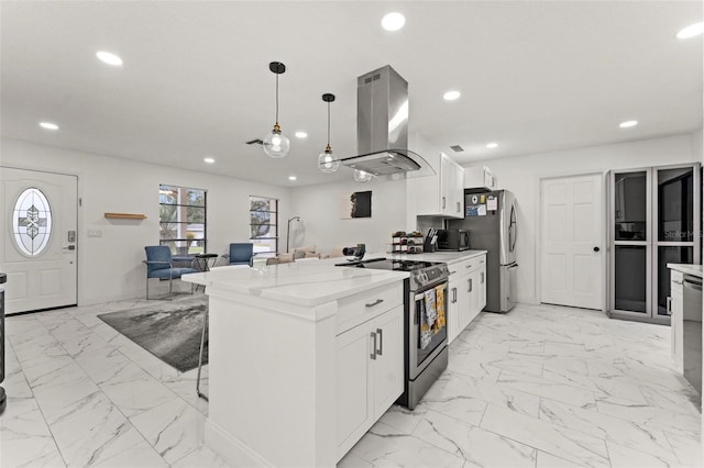 kitchen with white cabinetry, island exhaust hood, appliances with stainless steel finishes, and hanging light fixtures