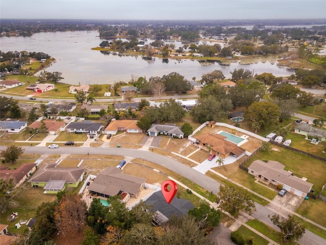 drone / aerial view featuring a water view