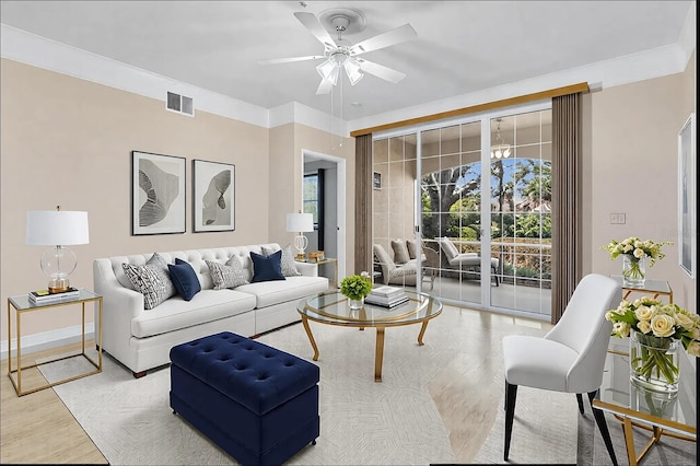 living room featuring ceiling fan and light wood-type flooring