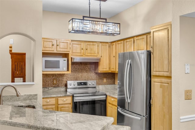 kitchen with sink, stainless steel appliances, and light brown cabinets