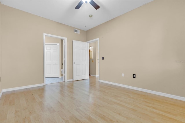 unfurnished bedroom featuring light hardwood / wood-style floors and ceiling fan