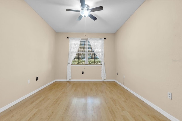 unfurnished room with ceiling fan and light hardwood / wood-style floors