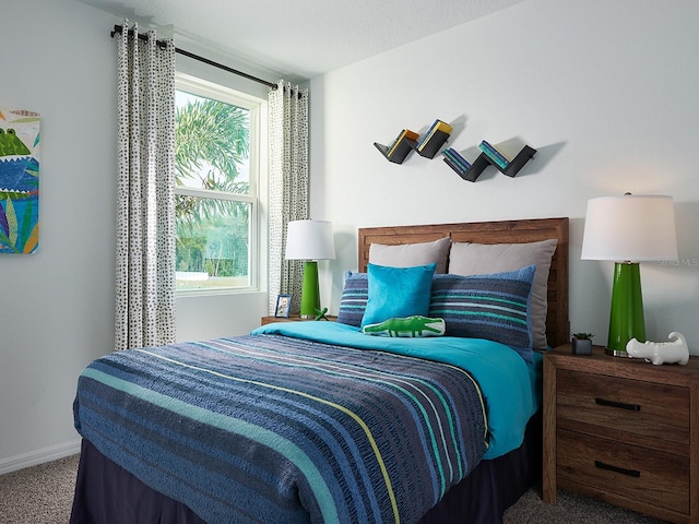 bedroom with multiple windows and carpet flooring