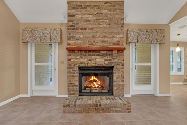 room details featuring a brick fireplace