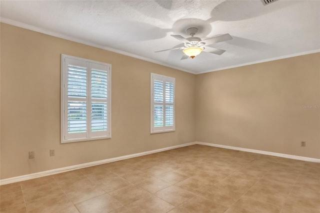 spare room with crown molding and ceiling fan