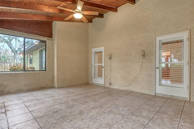 interior space with ceiling fan