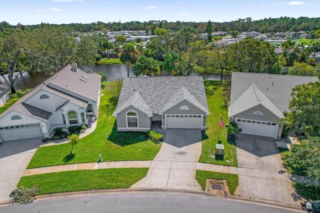 aerial view with a water view and a residential view