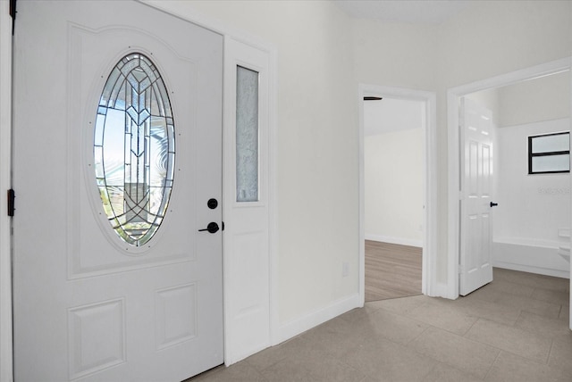 entrance foyer with baseboards