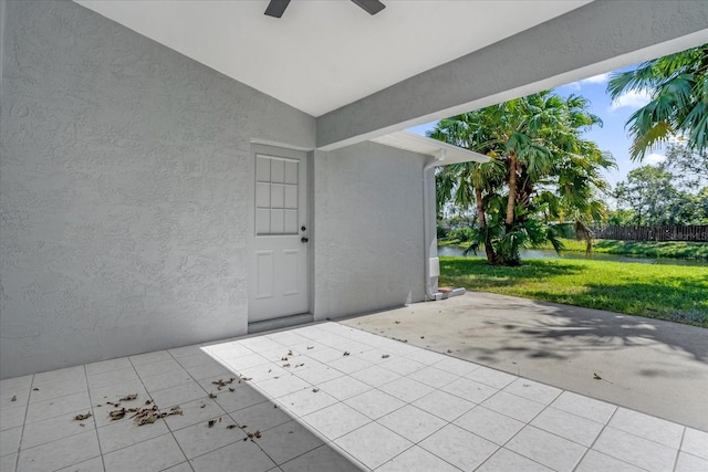 view of patio / terrace featuring ceiling fan