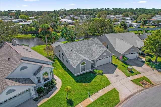 birds eye view of property with a residential view