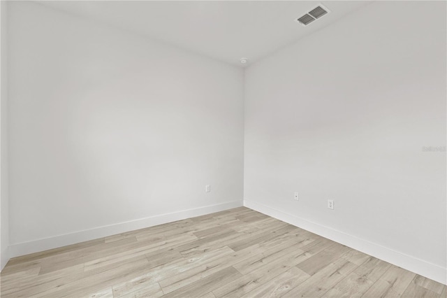 empty room with light wood-type flooring