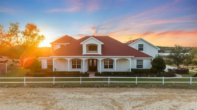 view of new england style home