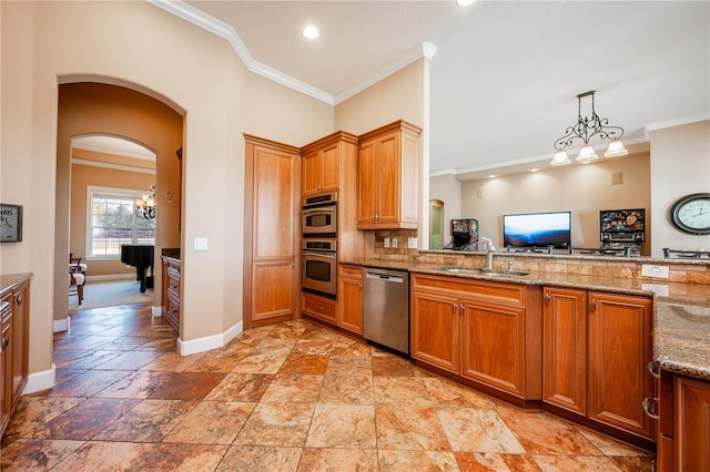 kitchen with tasteful backsplash, sink, ornamental molding, and stainless steel appliances