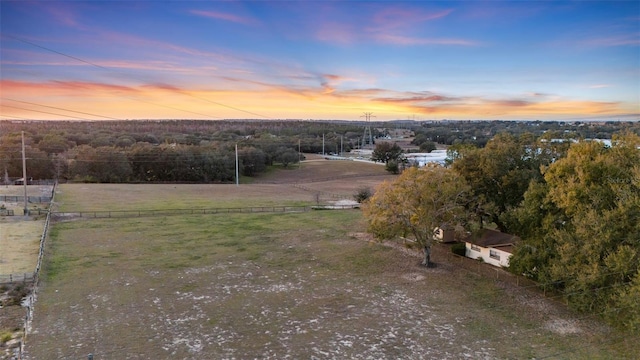 view of yard at dusk