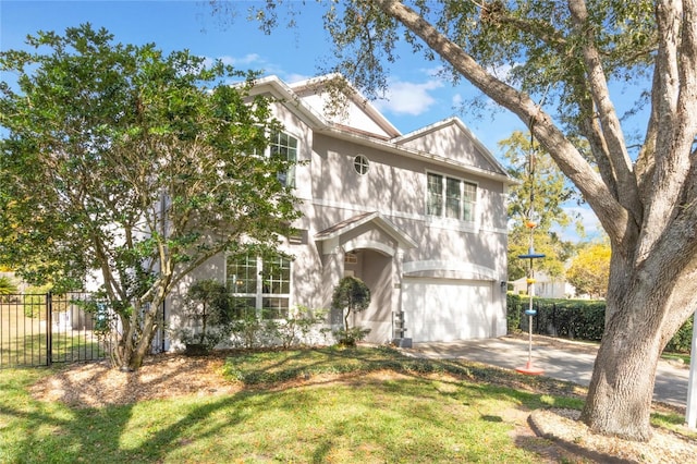 view of front of house featuring a garage and a front lawn