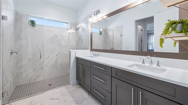 bathroom with vanity and a shower with shower door