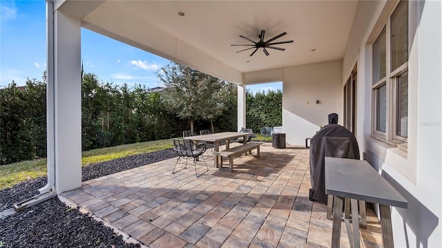 view of patio / terrace featuring ceiling fan and a grill