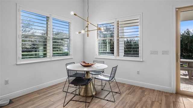 dining area featuring a chandelier