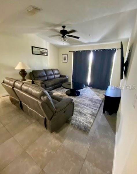 living room with ceiling fan