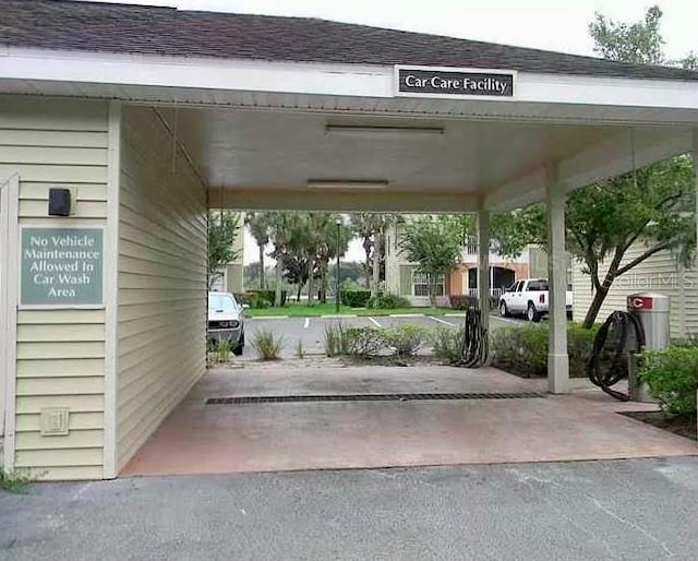 exterior space with a carport