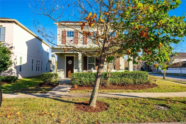 view of front facade featuring a front yard