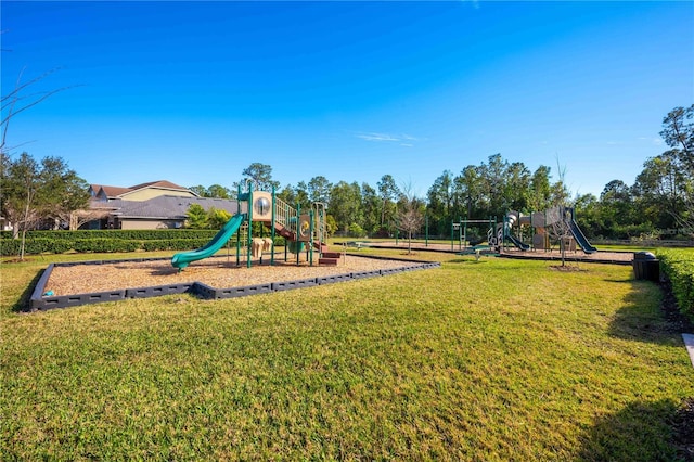 view of jungle gym featuring a yard